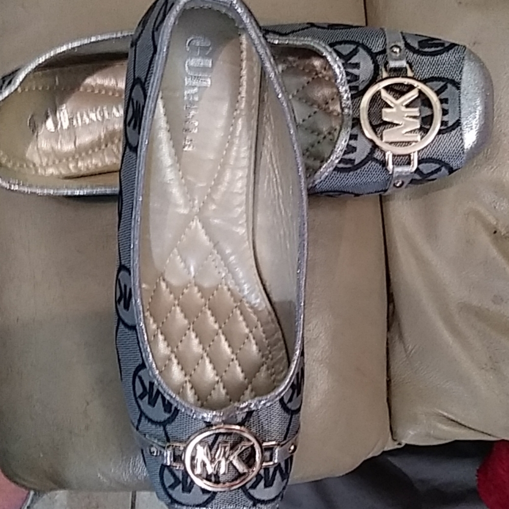 Michael Kors flats.